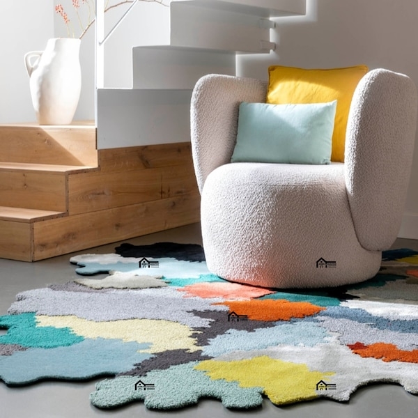 Colorful Abstract Area Rug with Cozy Modern Chair