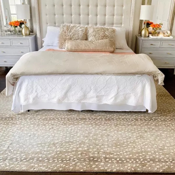Cozy Bedroom with Neutral Antelope Pattern Carpet