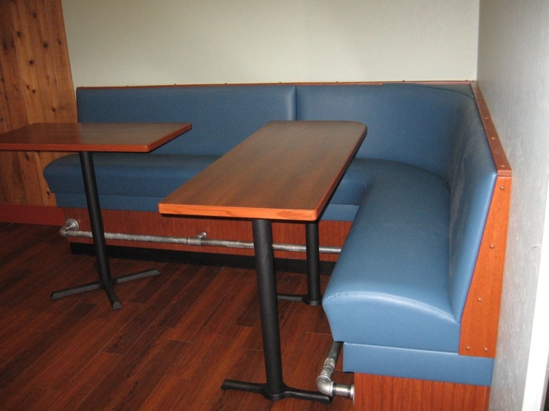 Cozy Blue Upholstered Dining Booths with Wooden Tables