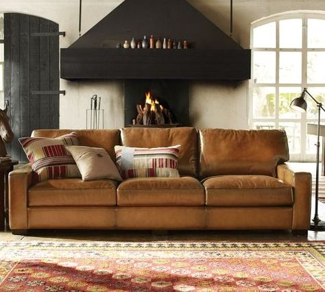 Cozy Caramel Leather Sofa in Rustic Living Room