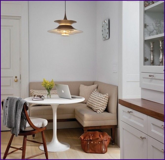 Cozy Corner Banquette Dining Nook with Modern Pendant
