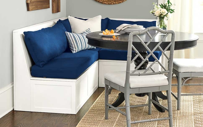 Cozy Corner Banquette Seating with Blue Cushions
