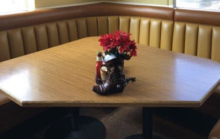 Cozy Corner Booth Seating with Hexagonal Table