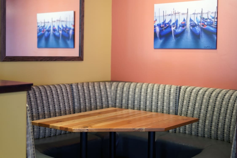 Cozy Corner Booth Seating with Wooden Table