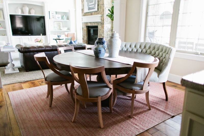 Cozy Curved Bench Seating with Round Wooden Dining Table