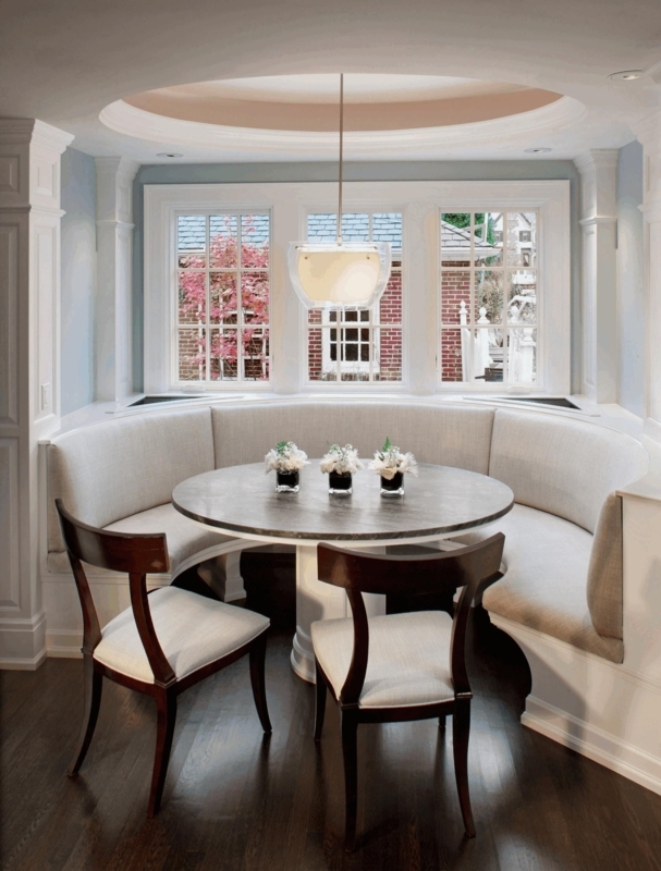 Cozy Curved Kitchen Booth with Round Table