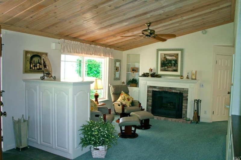 Cozy Living Room with Wood Plank Ceiling