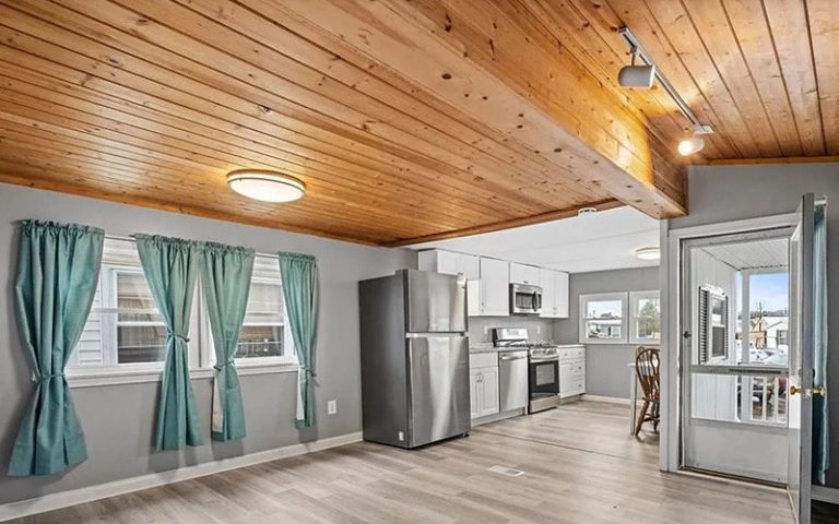 Cozy Mobile Home Kitchen with Wood Ceiling Panels