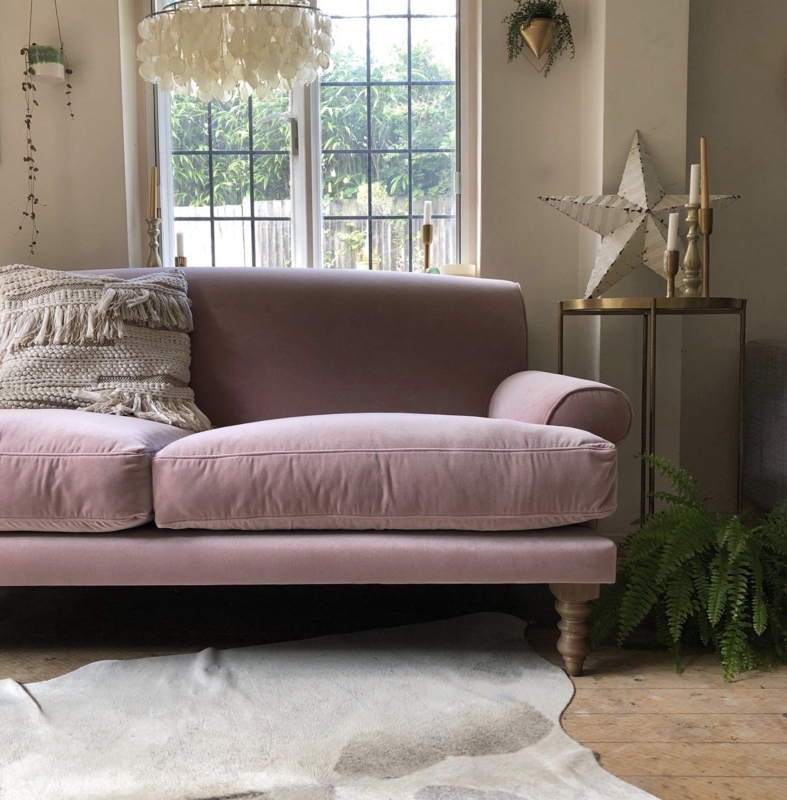 Cozy Pink Velvet Sofa with Elegant Neutral Decor