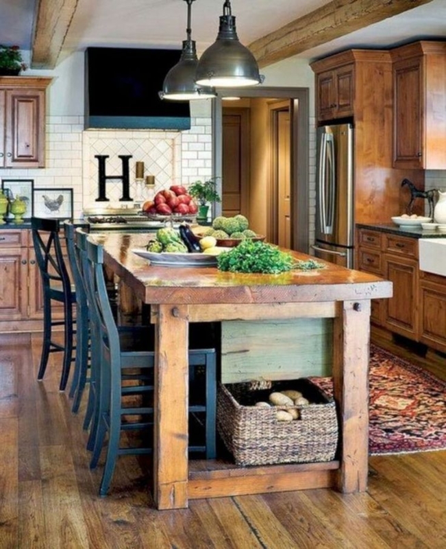 Cozy Rustic Kitchen with Wooden Island and Black Accents