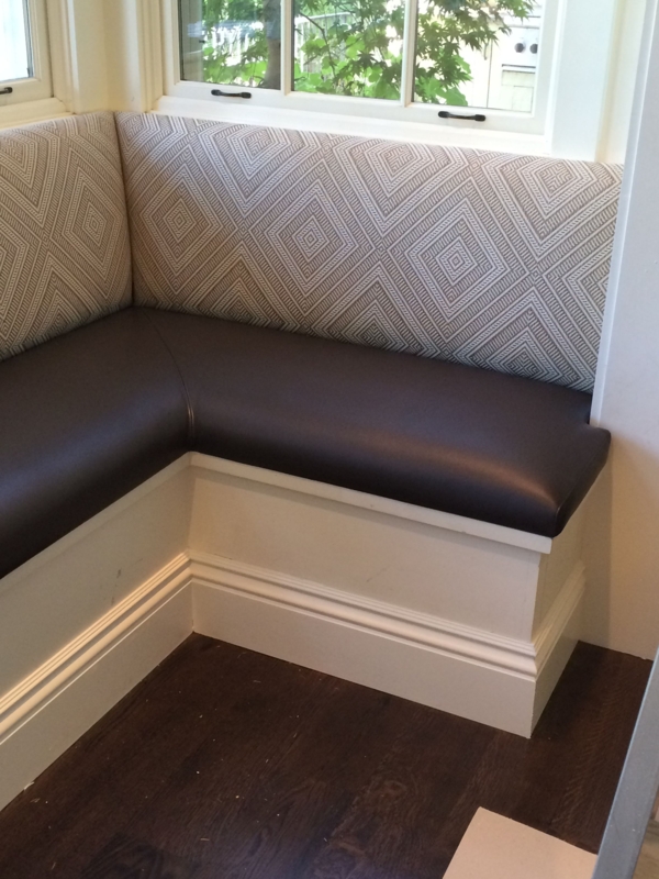 Cozy Upholstered Banquette with Leather Seat