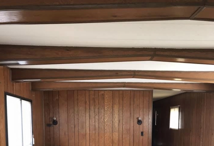 Cozy Wood-Beamed Gypsum Ceilings in Mobile Homes