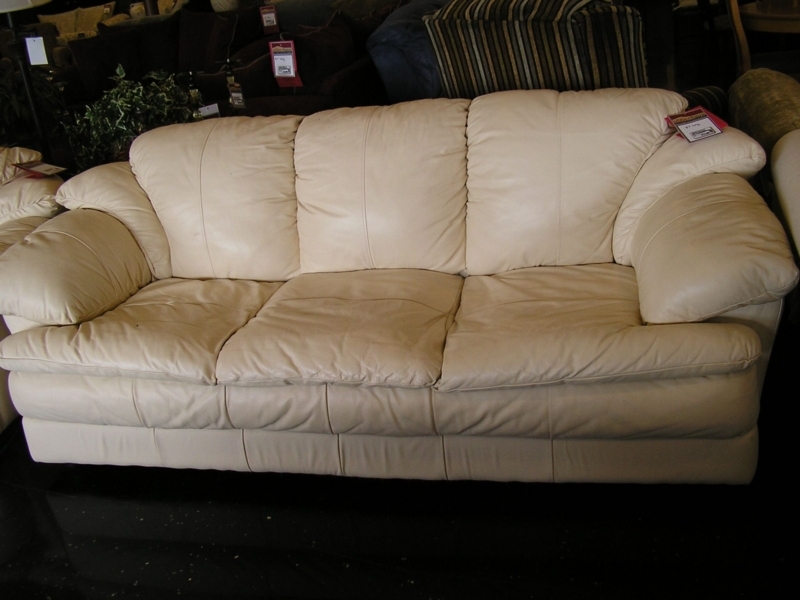 Cream Leather Sofa with Plush Cushions