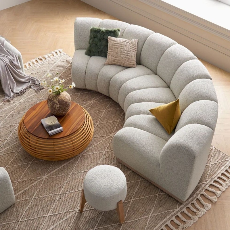 Curved Neutral Tone Sofa with Textured Accents