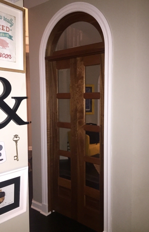 Elegant Arch-Shaped French Doors with Wood Finish