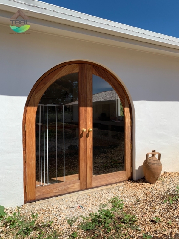 Elegant Arched Wooden Barn Doors with Glass Panels