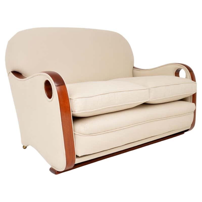 Elegant Beige Art Deco Sofa with Wooden Accents