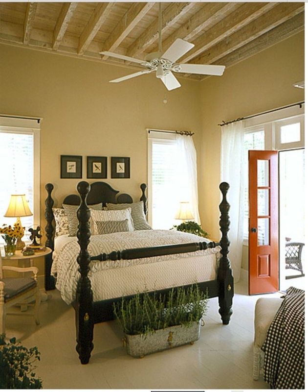 Elegant Black Four Poster Bed in Cozy Bedroom