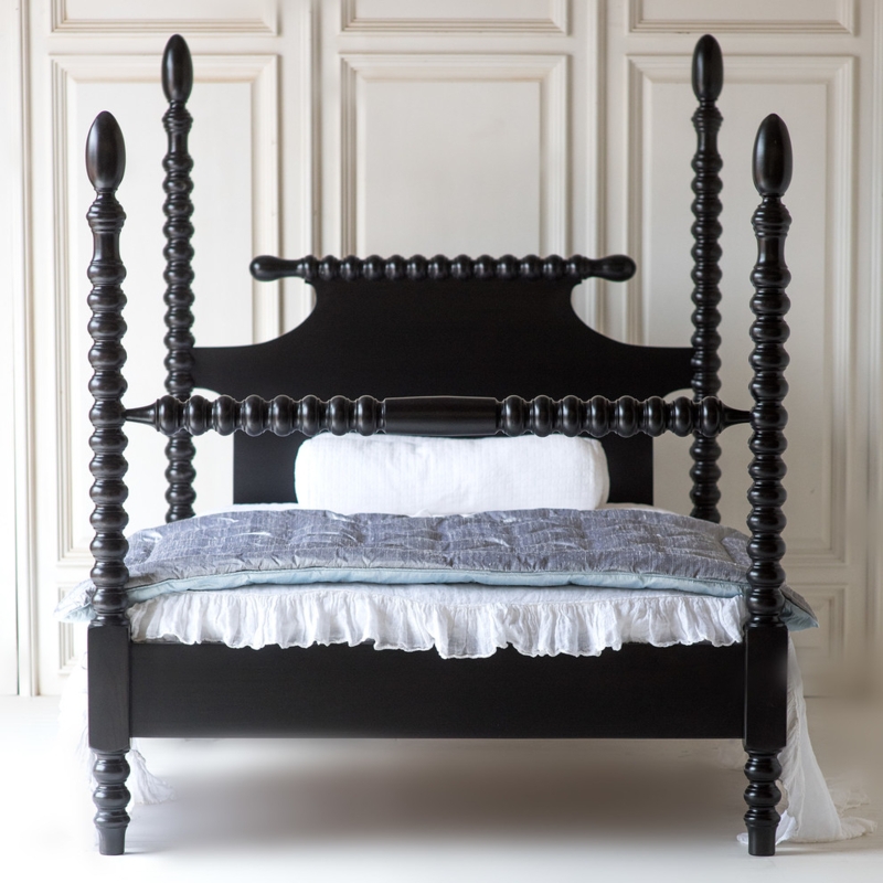 Elegant Black Spindle Four-Poster Bed Design