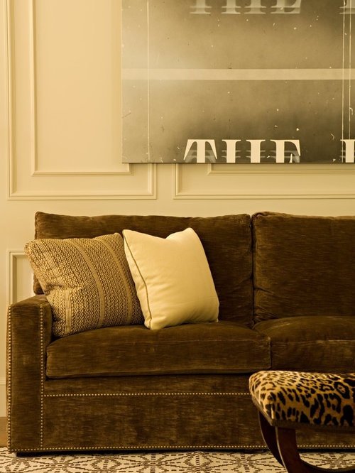 Elegant Brown Velvet Sofa with Textured Accent Pillows
