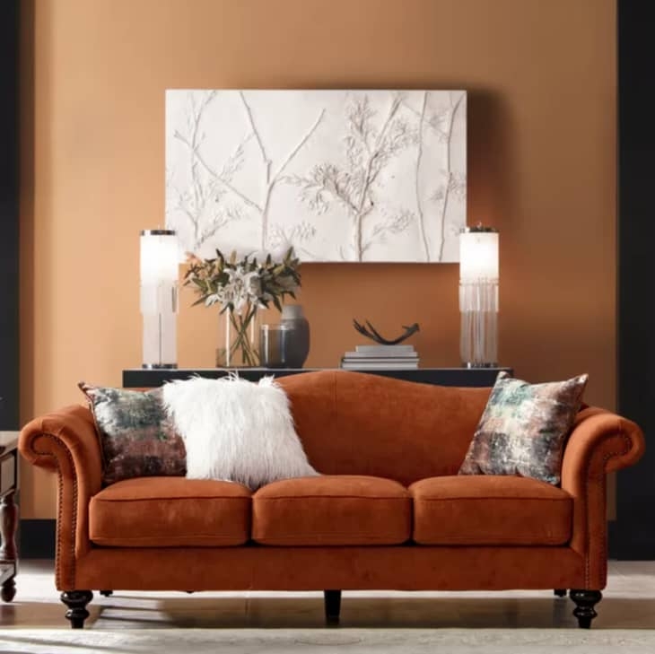 Elegant Camelback Sofa in Warm Earth Tones