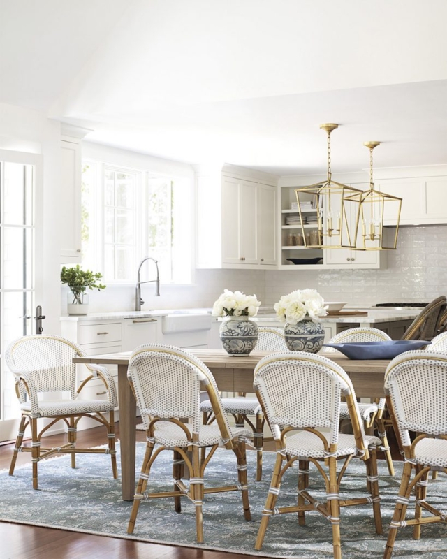 Elegant Coastal Dining Room with Rattan Chairs