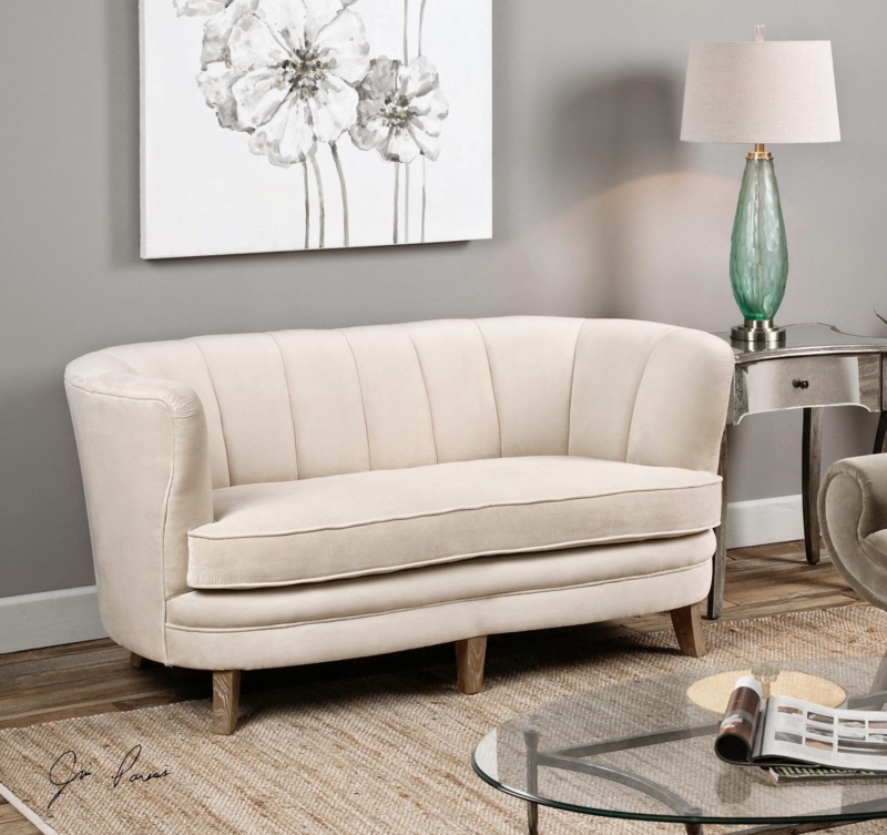 Elegant Cream Curved Back Sofa in Living Room
