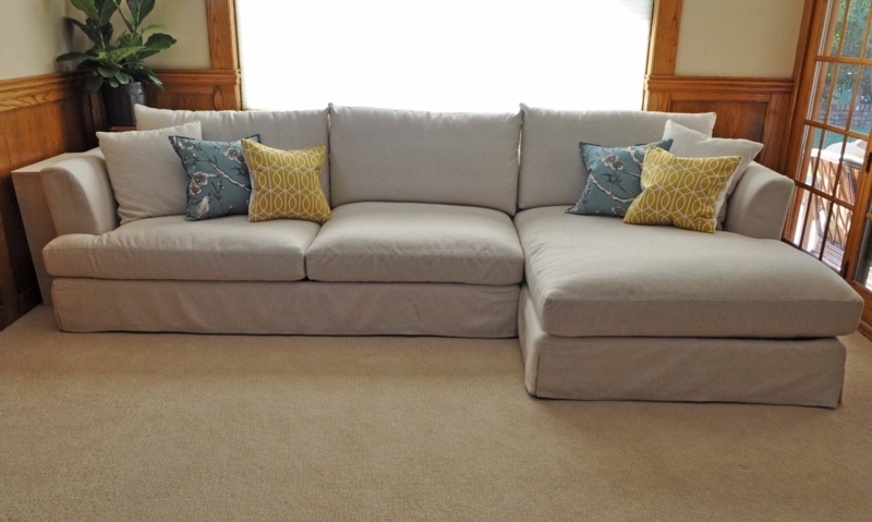 Elegant Cream Sectional Sofa with Patterned Pillows