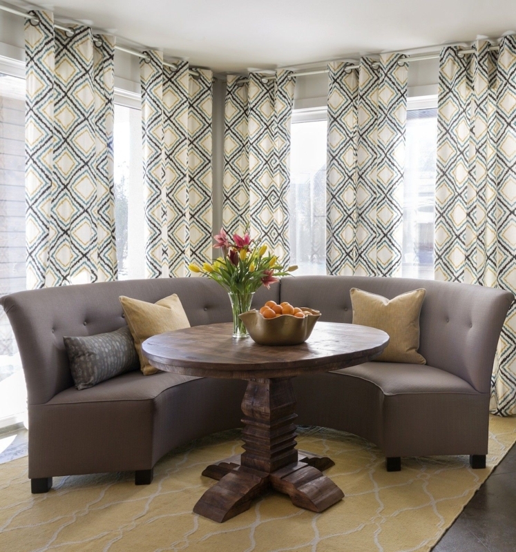 Elegant Curved Banquette Seating with Wooden Table