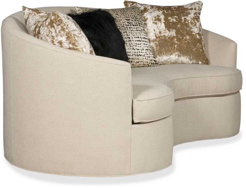 Elegant Curved Beige Sofa with Decorative Pillows