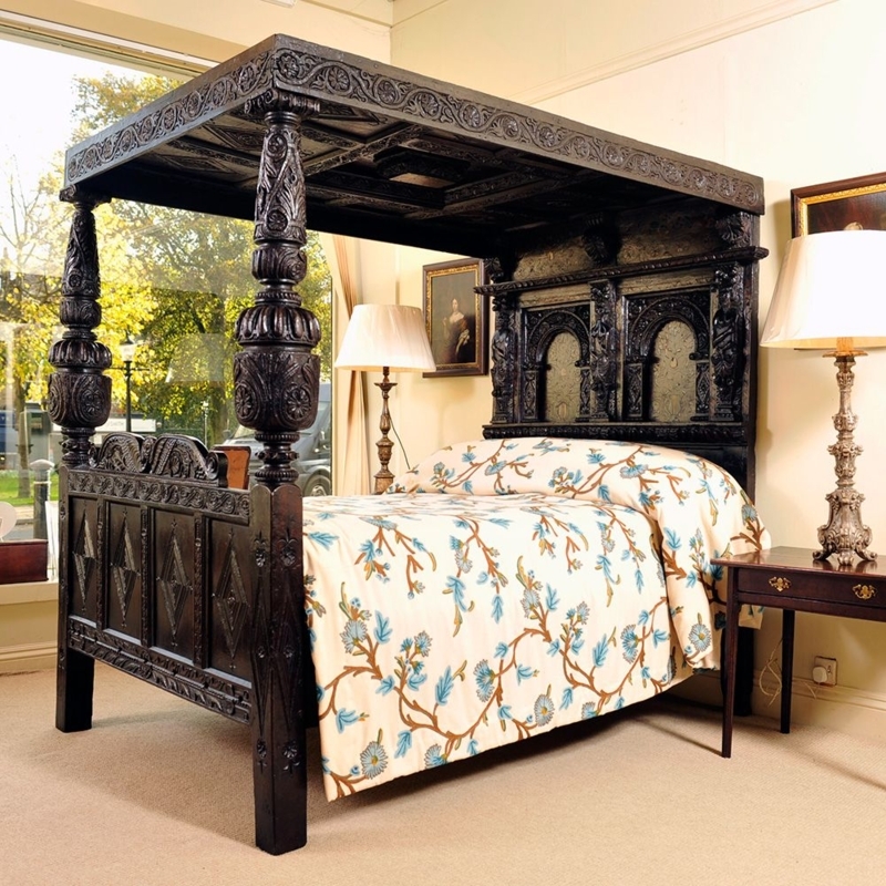 Elegant Dark Wood Four Poster Bed with Floral Bedding