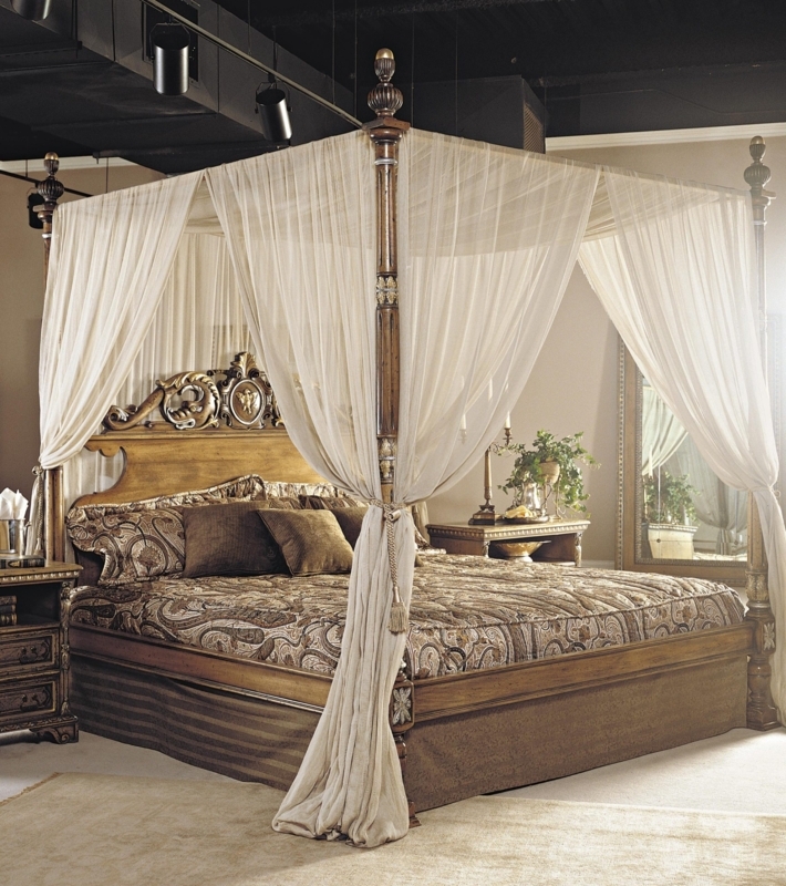 Elegant Four Poster King Bed with Sheer Drapes