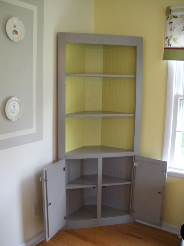 Elegant Gray Corner Cabinet with Yellow Interior