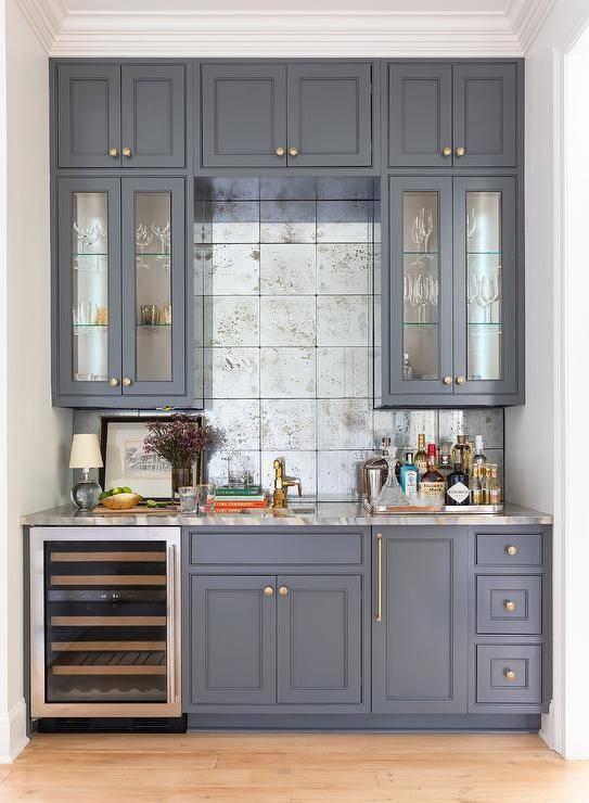 Elegant Gray Wet Bar with Mirrored Backsplash