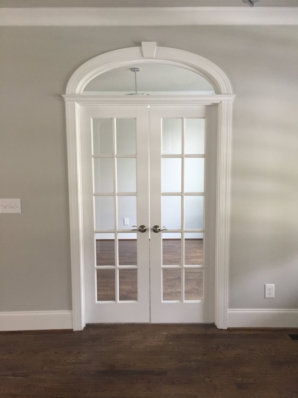 Elegant Interior Arched French Doors with Glass Panels