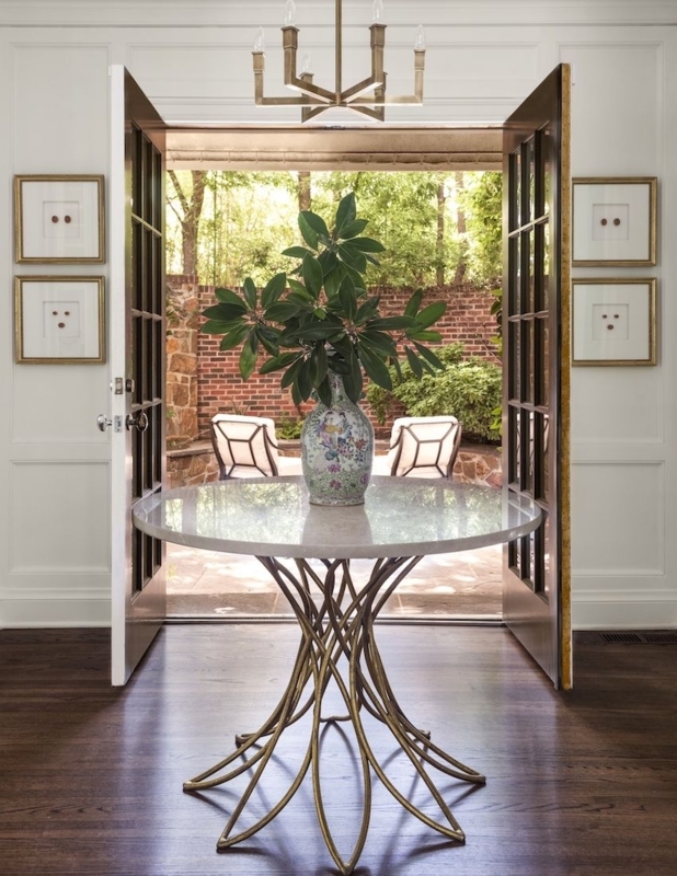 Elegant Round Entry Table with Sculptural Base