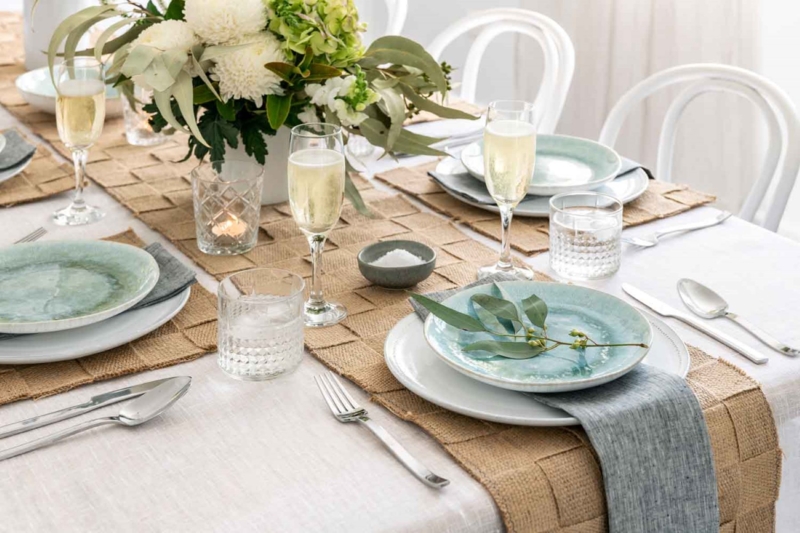 Elegant Table Setting with Natural Placemats and Runners