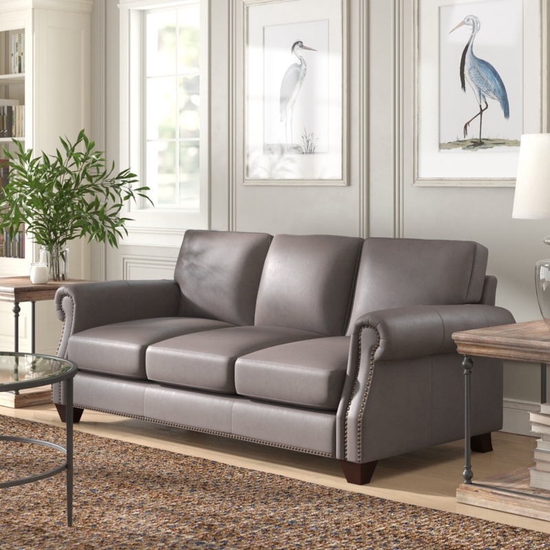 Elegant Taupe Leather Sofa with Nailhead Trim