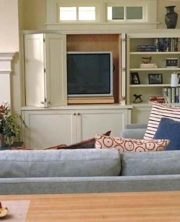 Elegant TV Concealment with Built-In Cabinet Doors