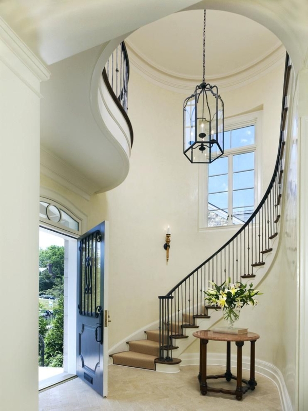 Elegant Two-Story Foyer with Curved Staircase