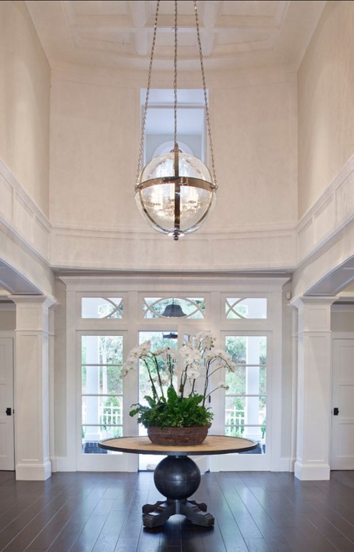 Elegant Two-Story Foyer with Glass Globe Chandelier