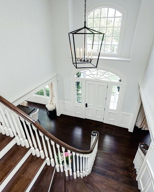 Elegant Two-Story Foyer with Modern Chandelier