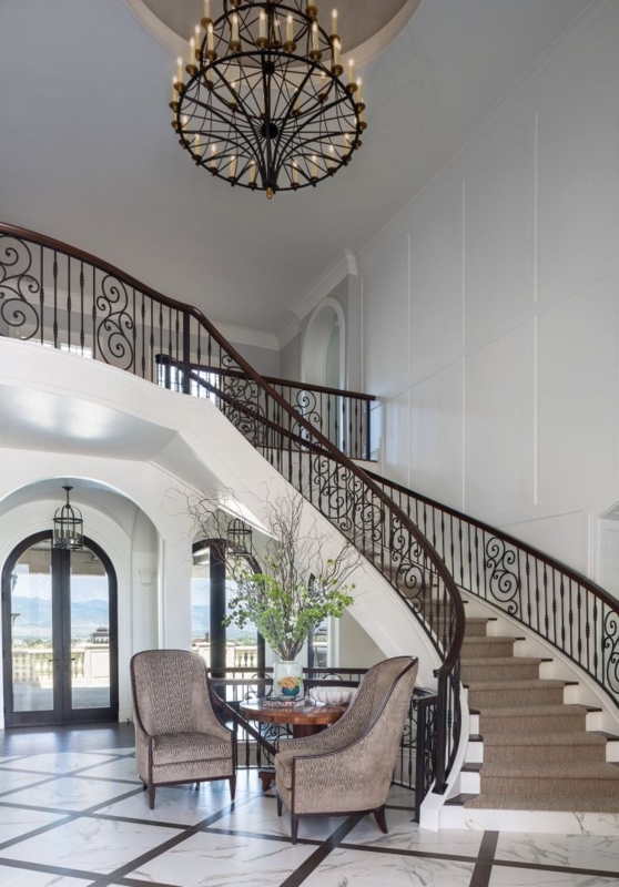 Elegant Two-Story Foyer with Ornate Staircase
