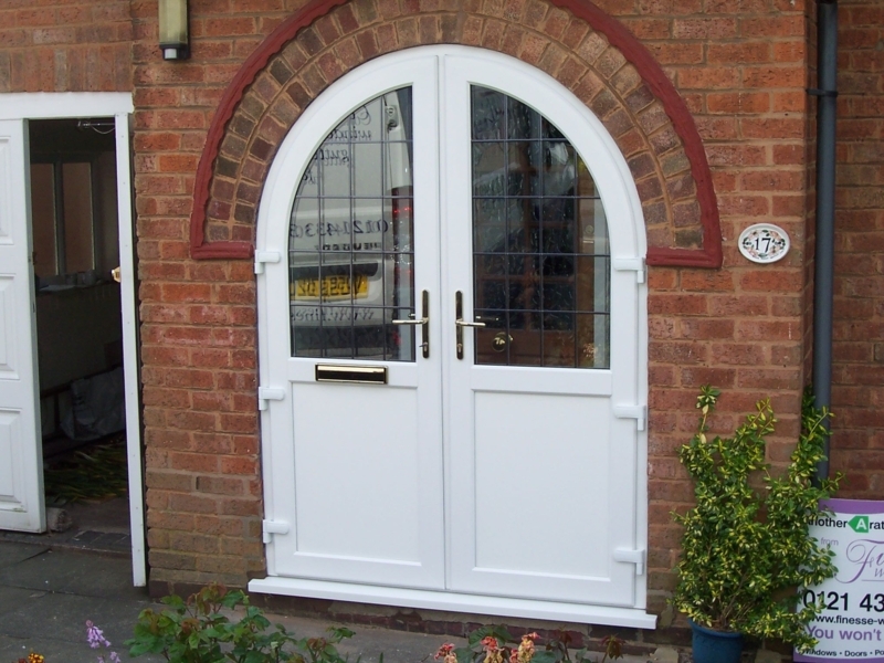 Elegant White Arched French Door Exterior