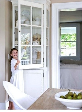 Elegant White Corner Cabinet for Dining Room Storage