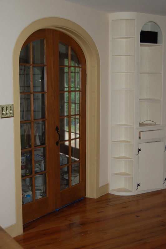 Elegant Wooden Arched French Doors with Built-in Shelves