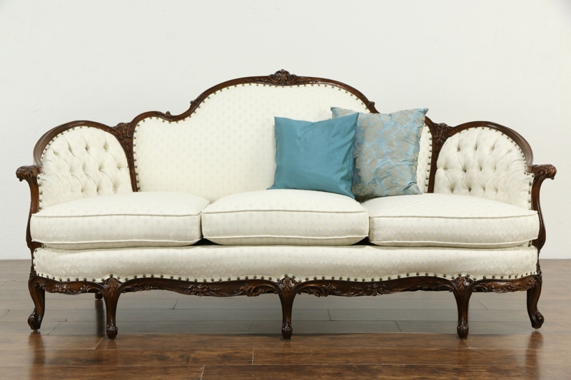 French Vintage Carved Sofa with Elegant Upholstery