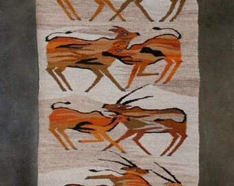 Handwoven Antelope Pattern Wool Rug