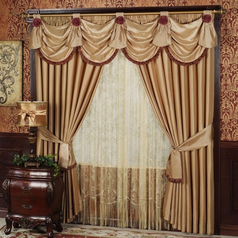 Luxurious Gold Drapes with Ornate Valance Decoration