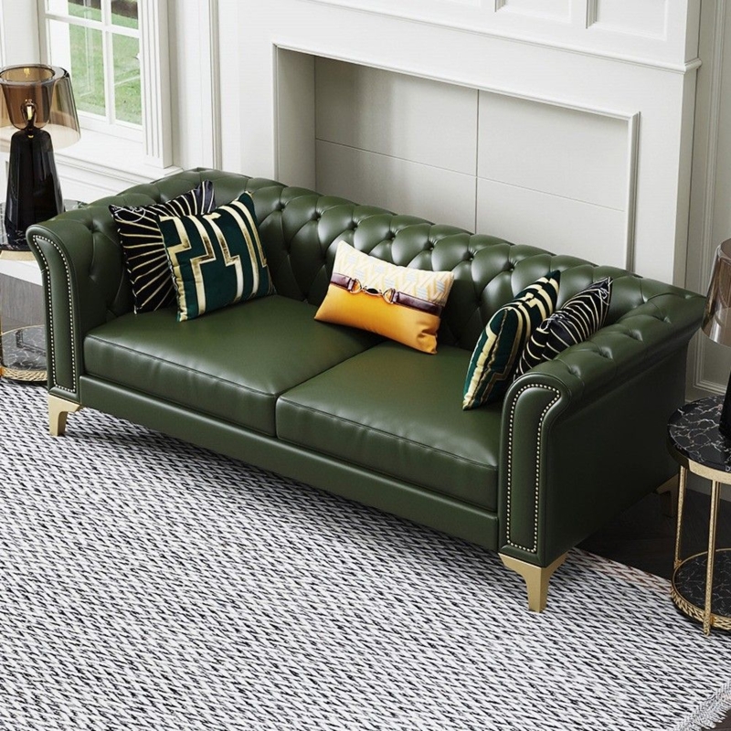 Luxurious Green Tufted Chesterfield Sofa with Decorative Pillows